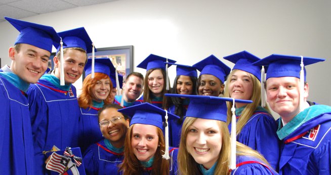 Students pose before the commencement ceremony begins.